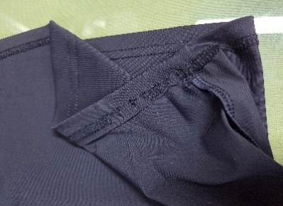 Pocket seam sewn in the wrong direction on stretch pants